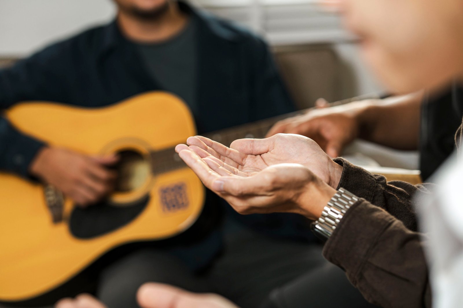A group of young Christians working together to pray and seek bl A group of young Christians working together to pray and seek blessings from God, the Bible, Christian ideas, sharing the gospel with each other.